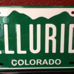 Photo of a license plate that reads "Telluride" - Colorado Pest Management