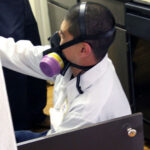Colorado Pest Management technician wearing face ventilator