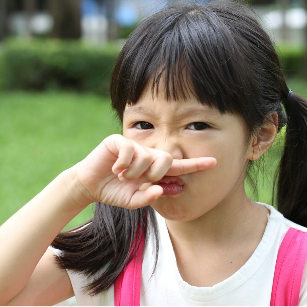 Child smelling rodent