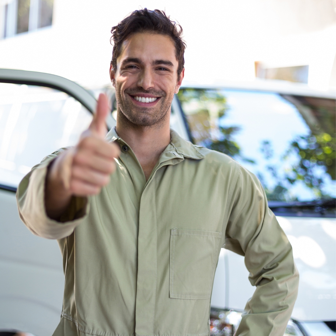 Man smiling thumbs up