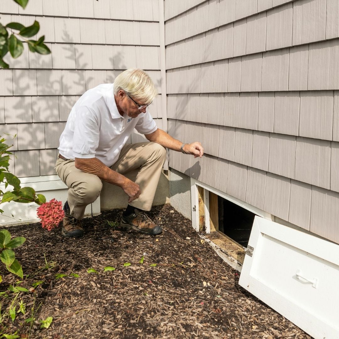inspector checking open vents